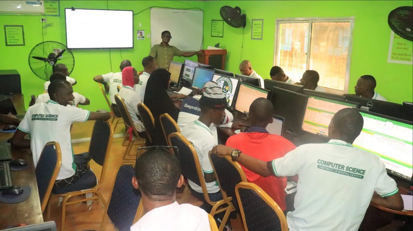 DEVT Computer Science students at workstations during class